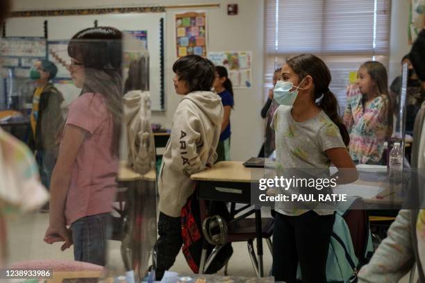 Thrid grade students participate in class at Highland Elementary School in Las Cruces, New Mexico on March 4, 2022. - In late January, amid staffing...