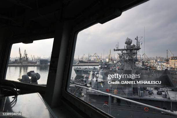 Military vessels are seen from the command bridge of Regele Ferdinand frigate, docked at the military harbour of Constanta, on March 4, 2022. In the...