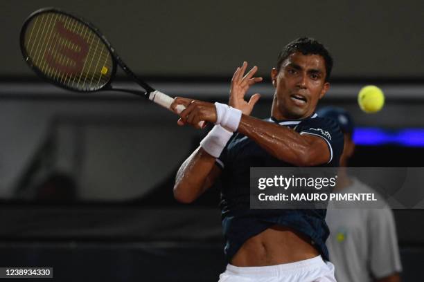 Brazilian tennis player Thiago Monteiro plays against German tennis player Jan-Lennard Struff during a Davis Cup match at the Rio 2016 Olympic Park...