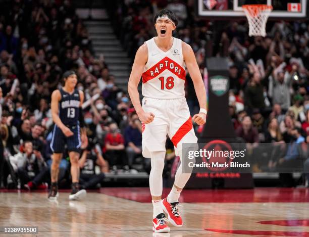 Yuta Watanabe of the Toronto Raptors celebrates against the Orlando Magic during the second half of their basketball game at the Scotiabank Arena on...