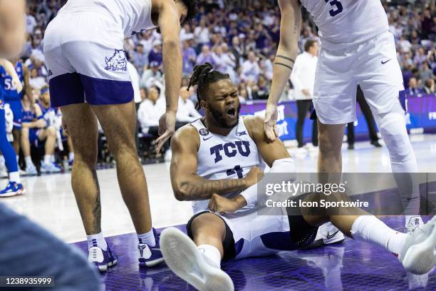 Horned Frogs center Eddie Lampkin Jr. Celebrates after taking a charge during the Big 12 college basketball game between the TCU Horned Frogs and...