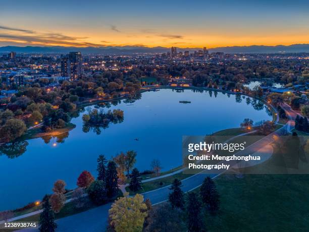 denver skyline around city park by drone - denver stock pictures, royalty-free photos & images