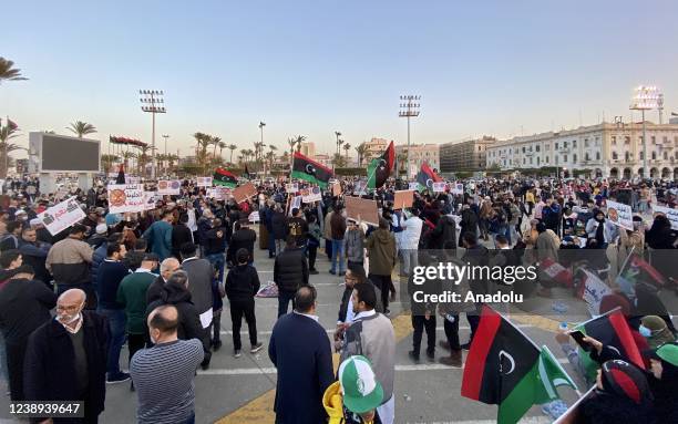 Hundreds of people stage a protest to demand elections in the country to be hold right away and ending the transitional period in Tripoli, Libya on...