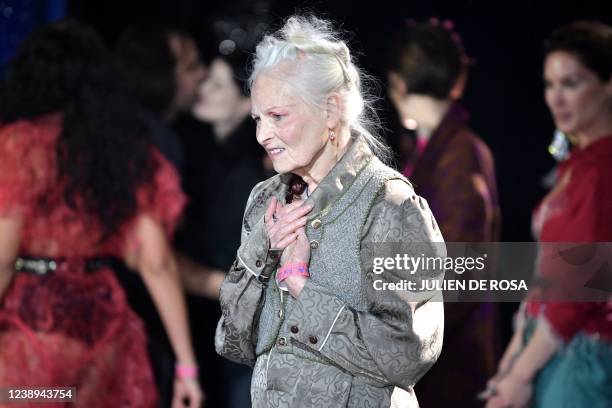 Fashion designer Vivienne Westwood acknowledges the audience at the end of the Vivienne Westwood Fall-Winter 2022-2023 collection fashion show during...