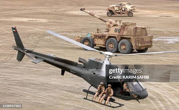 Soldiers and military helicopters from the United Arab Emirates Armed Forces demonstrate their skills during the Union Fortress 8 military...