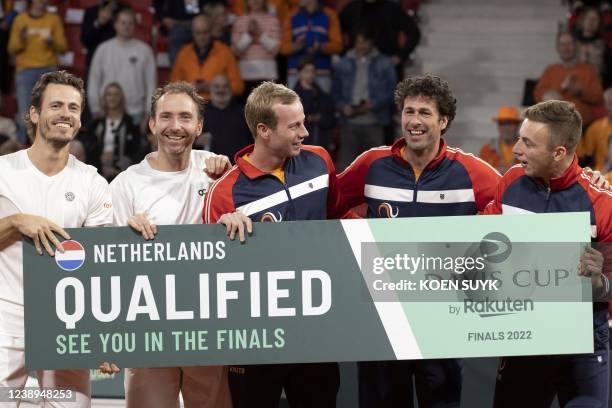 Wesley Koolhof and Matwe Middelkoop of the Netherlands celebrate their win over Canada with their teammates Botic van de Zandschulp, Robin Haase and...