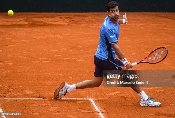 Maximo Gonzalez hits a forehand in his doubles with teammate Horacio Zeballos in the match against Tomas Machac and Jiri Lehecka of Czech Republic...