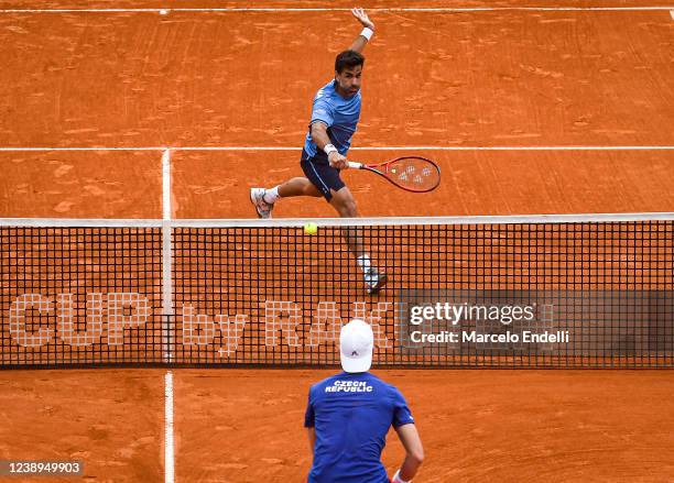Maximo Gonzalez hits a forehand in his doubles with teammate Horacio Zeballos in the match against Tomas Machac and Jiri Lehecka of Czech Republic...