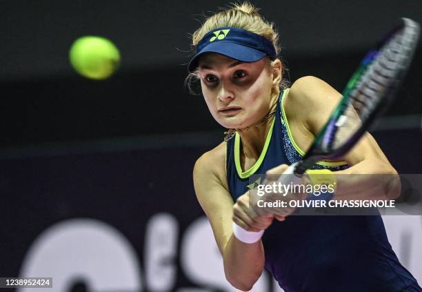 Ukraine's Dayana Yastremska returns the ball to Romanian Sorana Cirstea during the WTA 6eme Sens Open semi-final tennis match in Lyon, on March 5,...