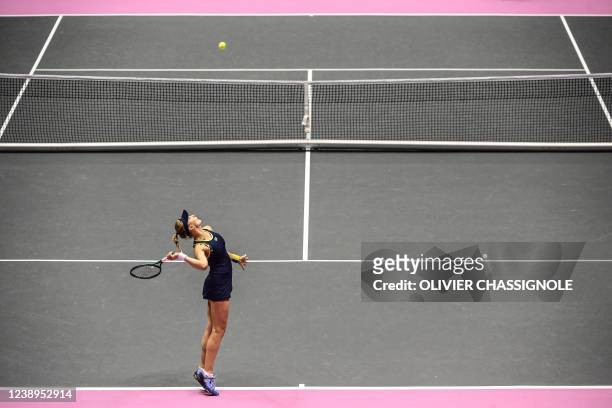 Ukraine's Dayana Yastremska serves the ball to Romanian Sorana Cirstea during the WTA 6eme Sens Open semi-final tennis match in Lyon, on March 5,...