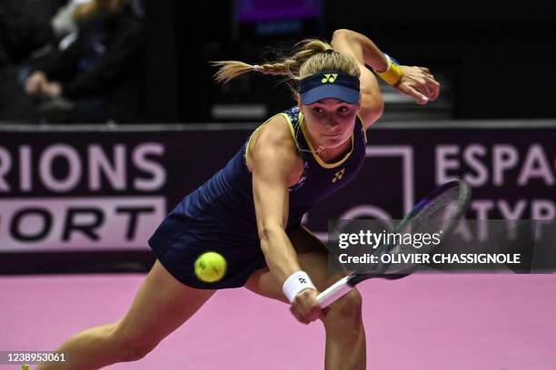 Ukraine's Dayana Yastremska returns the ball to Romanian Sorana Cirstea during the WTA 6eme Sens Open semi-final tennis match in Lyon, on March 5,...