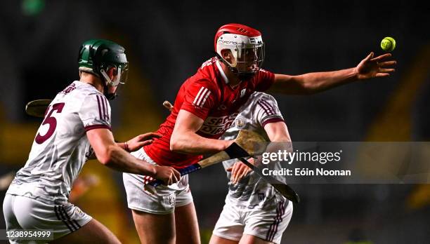 Cork , Ireland - 5 March 2022; Daire OLeary of Cork concedes a free for a foul hand pass while under pressure from Gavin Lee of Galway during the...