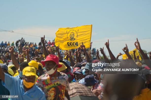 Supporters of the opposition Citizens Coalition for Change gather during an electoral rally at White City Stadium in Bulawayo on March 5, 2022. - The...