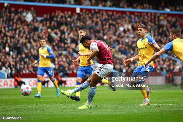 Ollie Watkins of Aston Villa scores the opening goal during the Premier League match between Aston Villa and Southampton at Villa Park on March 5,...