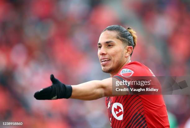 Carlos Salcedo of Toronto FC reacts as the referee checks the VAR during the second half of an MLS game at BMO Field against New York Red Bulls on...