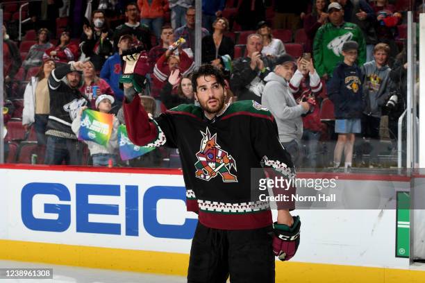 Nick Schmaltz of the Arizona Coyotes waves to fans after an 8-5 win against the Ottawa Senators at Gila River Arena on March 05, 2022 in Glendale,...