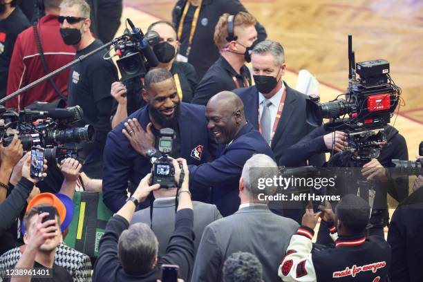Michael Jordan talks to LeBron James during the 2022 NBA All-Star Game as part of 2022 NBA All Star Weekend on February 20, 2022 at Rocket Mortgage...