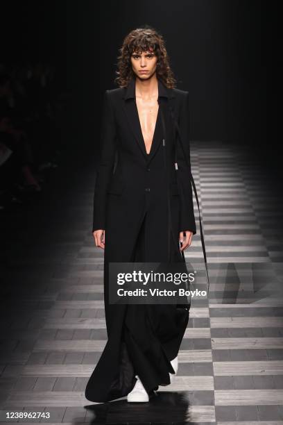 Model walks the runway during the Ann Demeulemeester Ready to Wear Fall/Winter 2022-2023 fashion show as part of the Paris Fashion Week on March 5,...