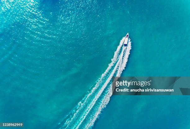 aerial view of yacht sailing on sea, asia, thailand. - boat wake stock pictures, royalty-free photos & images