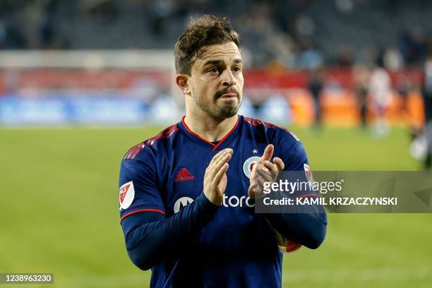 Chicago Fire midfielder Xherdan Shaqiri thanks the fans after the Major League Soccer football match against Orlando City at Soldier Field in...