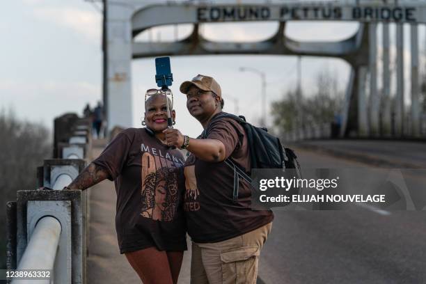 Two women take a selfie on the Edmund Pettus Bridge in Selma, Alabama on March 5, 2022. On "Bloody Sunday," March 7 some 600 civil rights marchers...