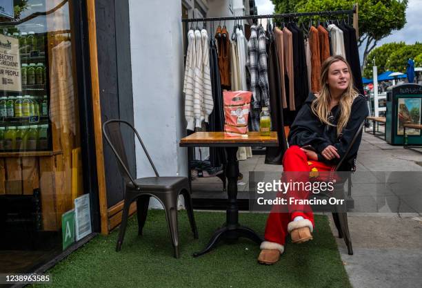 Madison Howell is drinking some celery juice outside Kreation Organic Friday, March 4, 2022 in Larchmont Village, neighborhood of Los Angeles CA....