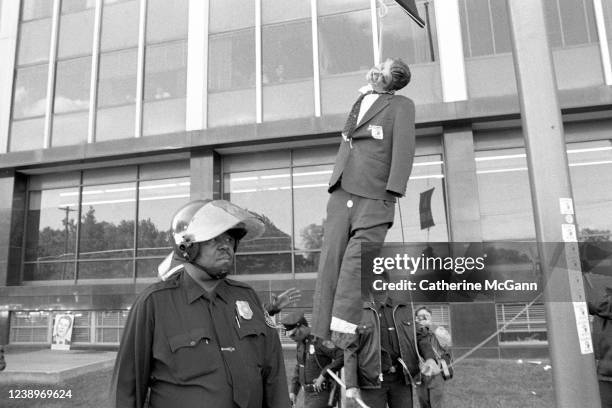 Activist group ACT UP protest at the headquarters of the Food and Drug Administration on October 11, 1988 in Rockville, Maryland. The action, called...