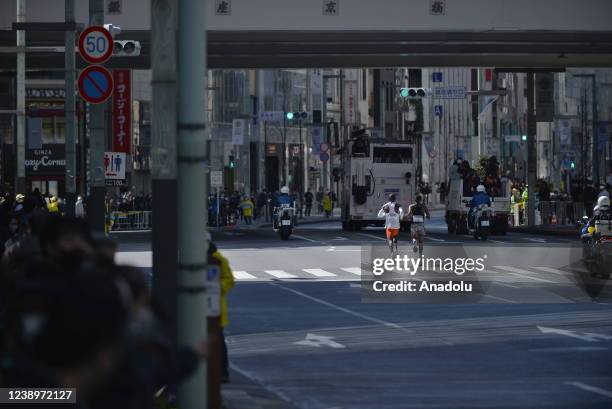 Eliud Kipchoge and Amos Kipruto , both from Kenya, compete together during the Tokyo Marathon 2021 at the streets of Tokyo, Japan on March 6, 2022....