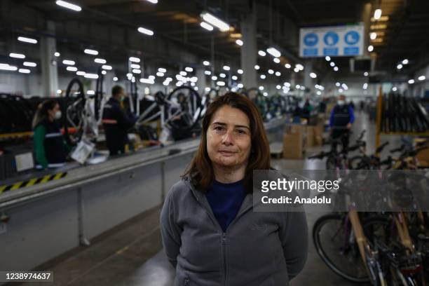 Yeliz Tuloglu, the manager of the assembly and wheel division of the factory, speaks during an exclusive interview at the bicycle factory in Manisa...
