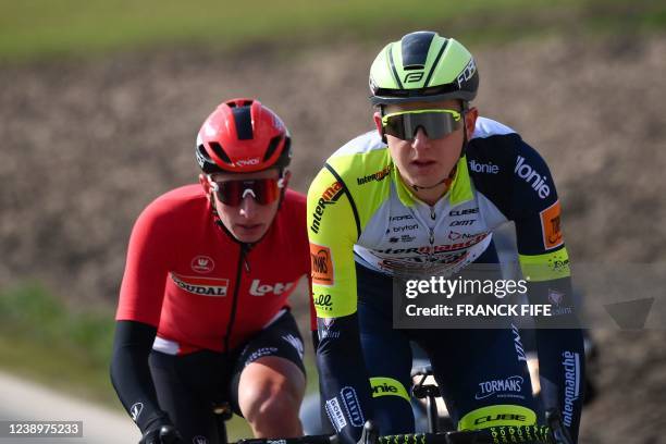 Intermarche-Wanty-Gobert Materiaux's Belgian rider Aime De Gendt and Lotto Soudal's British rider Matthew Holmes ride in a breakaway during the 1st...