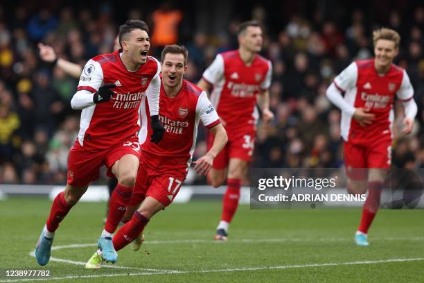 Arsenal's Brazilian striker Gabriel Martinelli celebrates after scoring his team third goal during the English Premier League football match between...