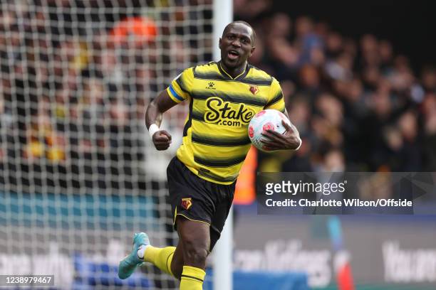 Moussa Sissoko of Watford celebrates scoring their 2nd goal as he takes the ball back the the centre spot during the Premier League match between...