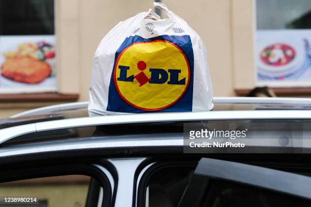 Lidl logo is seen on a plastic shopping bag in Przemysl, Poland on March 5, 2022.
