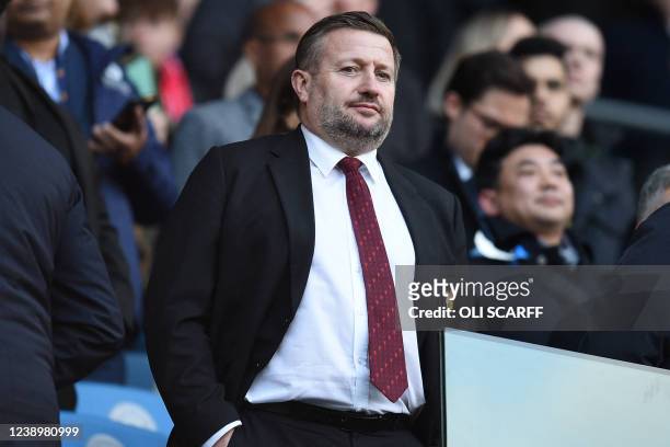 Manchester United's chief executive officer Richard Arnold takes his seat for the English Premier League football match between Manchester City and...