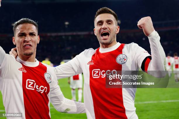 Dusan Tadic of Ajax celebrates 3-2 with Antony of Ajax during the Dutch Eredivisie match between Ajax v RKC Waalwijk at the Johan Cruijff Arena on...