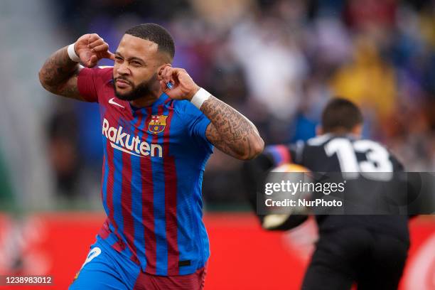 Memphis Depay of Barcelona celebrates after scoring his sides first goal during the La Liga Santander match between Elche CF and FC Barcelona at...