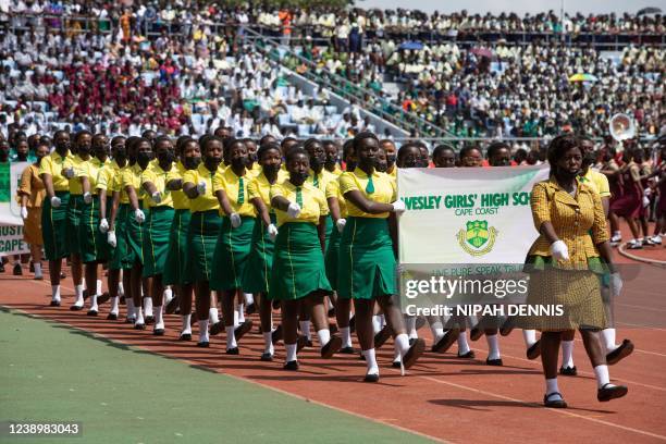 Students parade during the celebrations for Ghana 65th Independence Day at the Cape Coast Stadium on March 6, 2022. - Independendence Day is an...