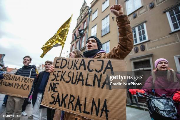 Protesters with feminist, pro-choice banners and anti Russia against Ukraine war banners are seen in Gdansk, Poland on 6 March 2022 The Manifa is...