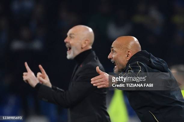 Milan's Italian head coach Stefano Pioli and Napoli's Italian head coach Luciano Spalletti give their instructions during the Italian Serie A...