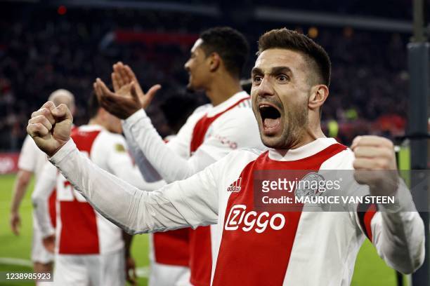 Ajax's Serbian midfielder Dusan Tadic celebrates 3-2 during the Dutch Eredivisie match between Ajax Amsterdam and RKC Waalwijk at the Johan Cruijff...