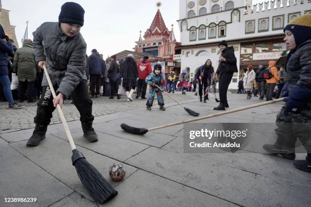 People play during the Maslenitsa festival in Moscow, Russia on March 6, 2022. Maslenitsa is known as the harbinger of spring and farewell to winter.