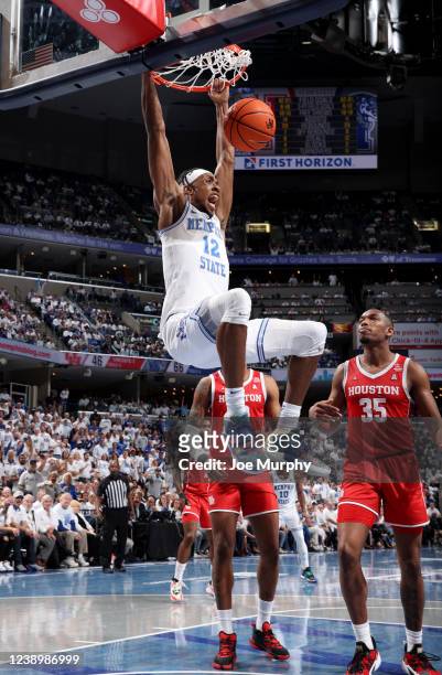 DeAndre Williams of the Memphis Tigers dunks the ball against the Houston Cougars during a game on March 6, 2022 at FedExForum in Memphis, Tennessee....