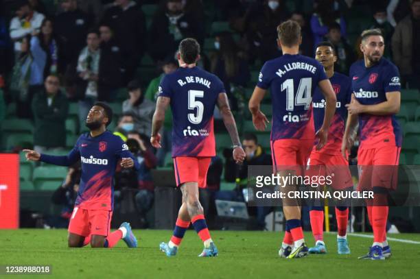 Atletico Madrid's French midfielder Thomas Lemar celebrates after scoring his team's third goal during the Spanish league football match between Real...