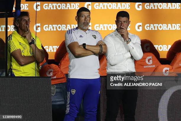 Boca Juniors' team coach Sebastian Battaglia is seen next to his assistant Juan Krupoviesa during their Argentine Professional Football League match...