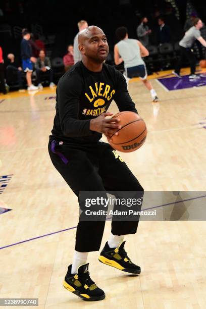 Assistant Coach John Lucas III helps with warmups before the game against the Dallas Mavericks on March 1, 2022 at Crypto.Com Arena in Los Angeles,...