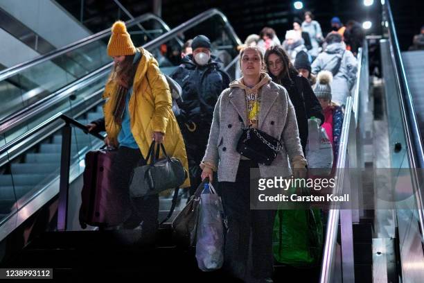 People fleeing war-torn Ukraine arrive on a train from Poland at the Hauptbahnhof main railway station on March 6, 2022 in Berlin, Germany. Over one...