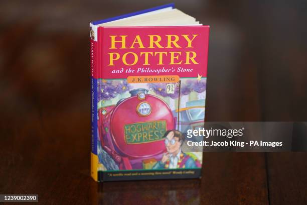 Pristine first edition hardback of JK Rowling's Harry Potter and the Philosopher's Stone, one of only 500 produced in the first print run in 1997, on...
