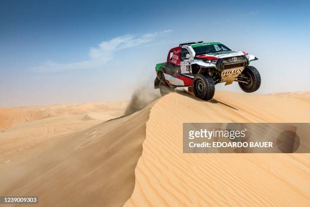 Saudi Arabia's Yazeed al-Rajhi competes during the Abu Dhabi Desert Challenge stage two on March 7, 2022.