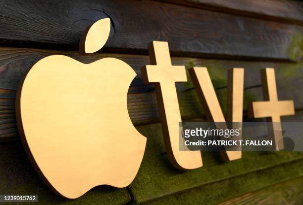 The Apple TV+ logo is seen on the backdrop for the red carpet arrivals of "The Last Days of Ptolemy Grey" premiere at the Bruin Theatre in Westwood,...