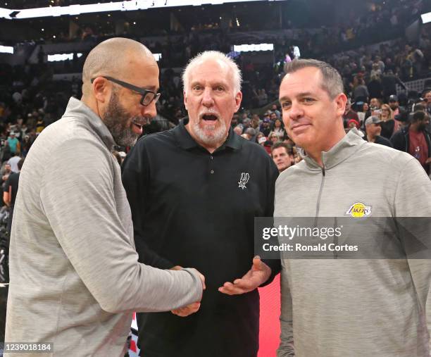 Head coach Gregg Popovich of the San Antonio Spurs is congratulated by head coach Frank Vogel and assistant coach David Fizdale of the Los Angeles...